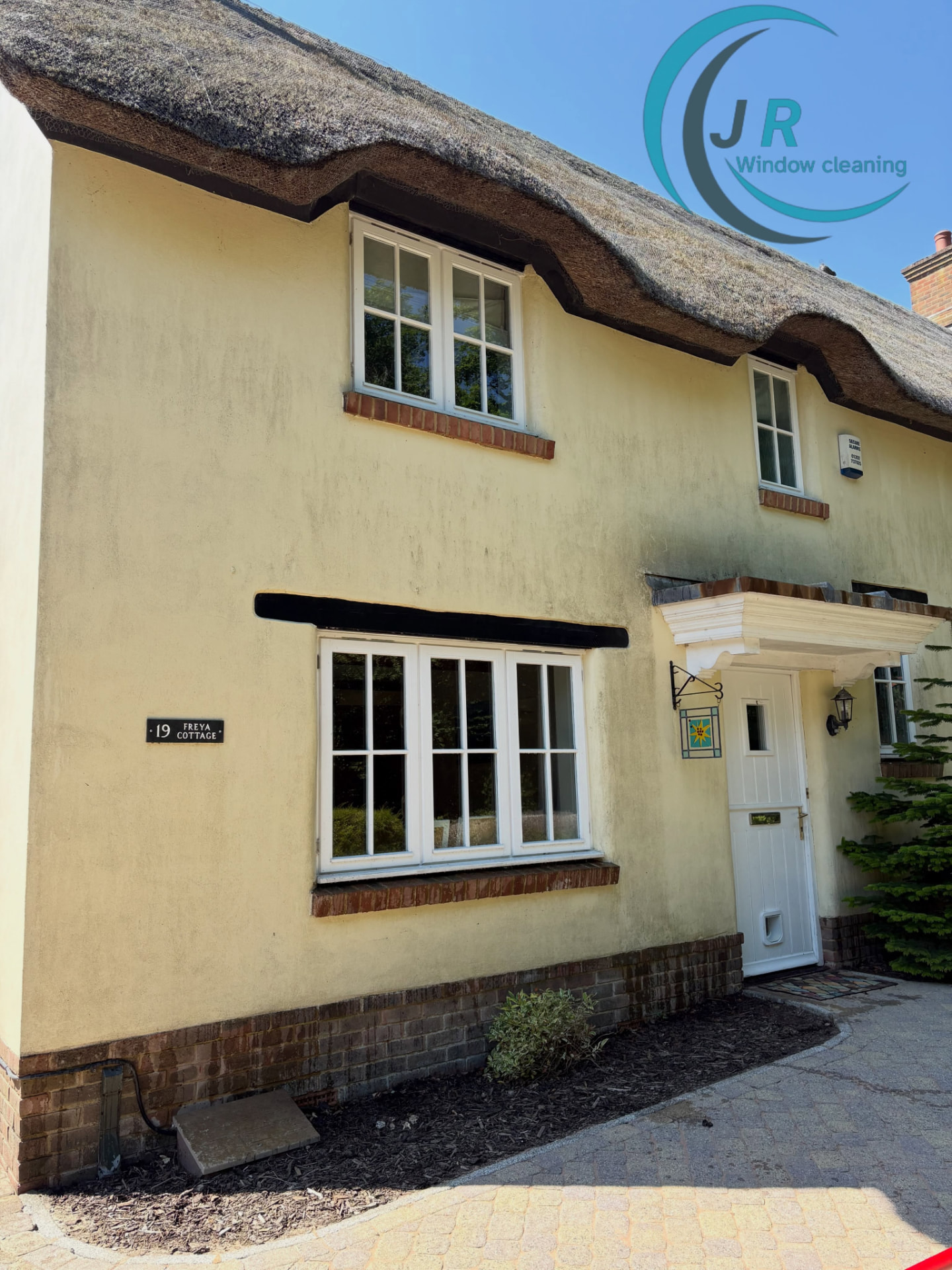 Before — Thatched cottage render soft washed